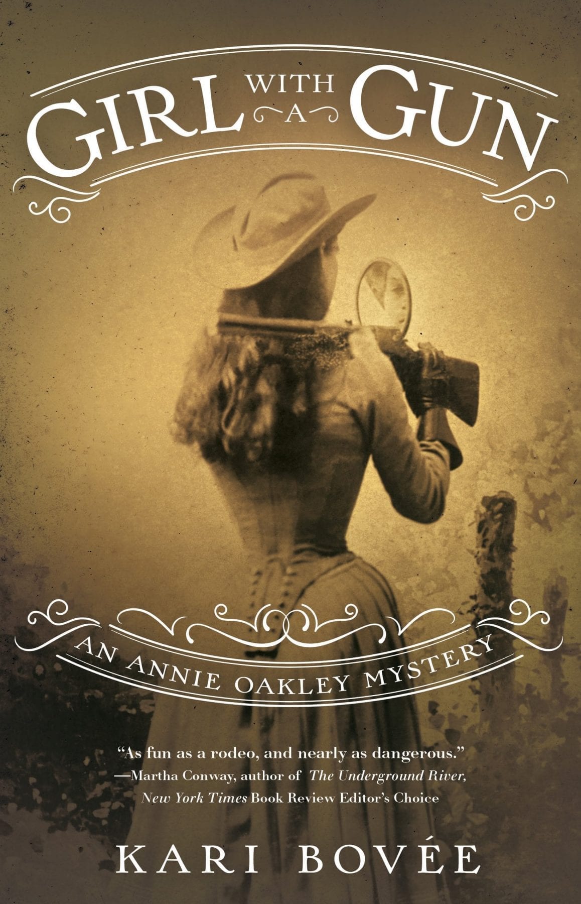 Girl with a Gun- An Annie Oakley Mystery by Kari Bovee