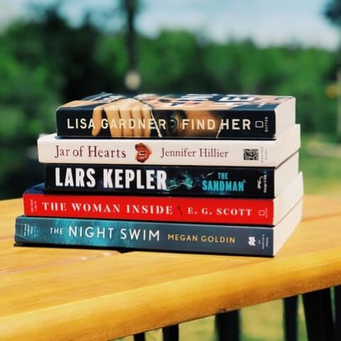 Stylized photo of a stack of thriller books